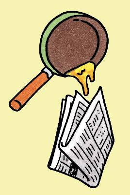 新聞紙に吸い込ませる